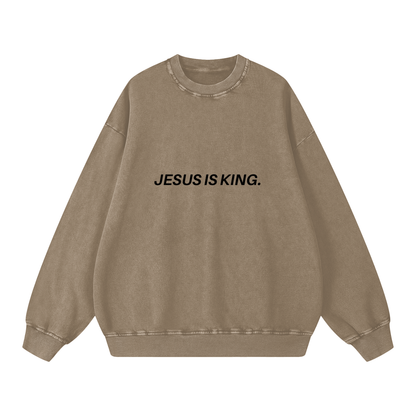 Brown sweatshirt with 'JESUS IS KING.' text on a white background