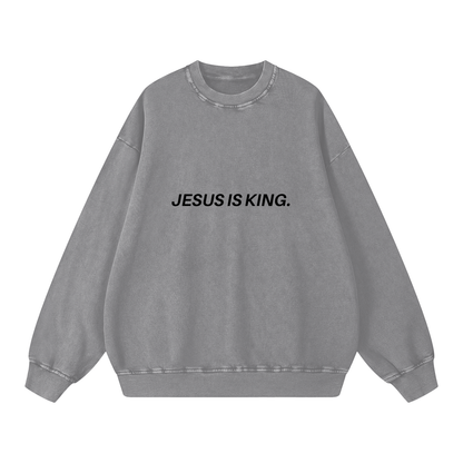 Gray sweatshirt with 'JESUS IS KING.' text on a white background